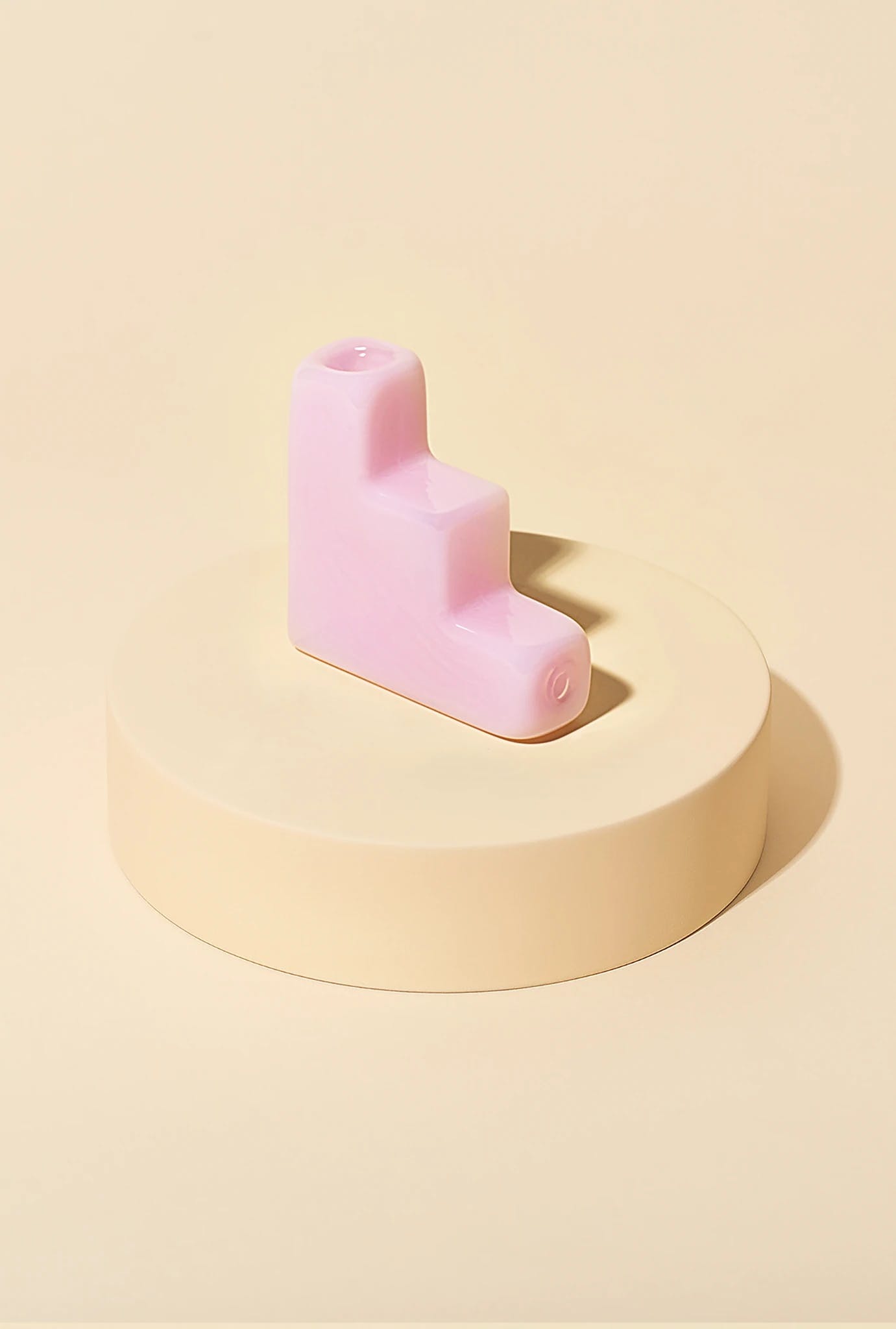 Pink smoking pipe that looks like a staircase.