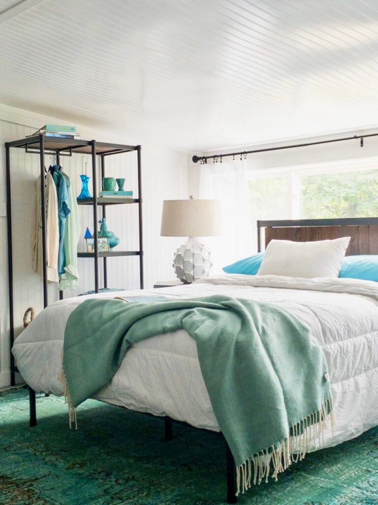 The Wesley Industrial Modern platform bed and etagere with hanging storage 